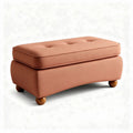 Ottoman de tela en color terracota con patas de madera 80 x 40 x 35cm