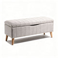 Banco tapizado en tela gris con almacenamiento de 100 x 40 x 45cm